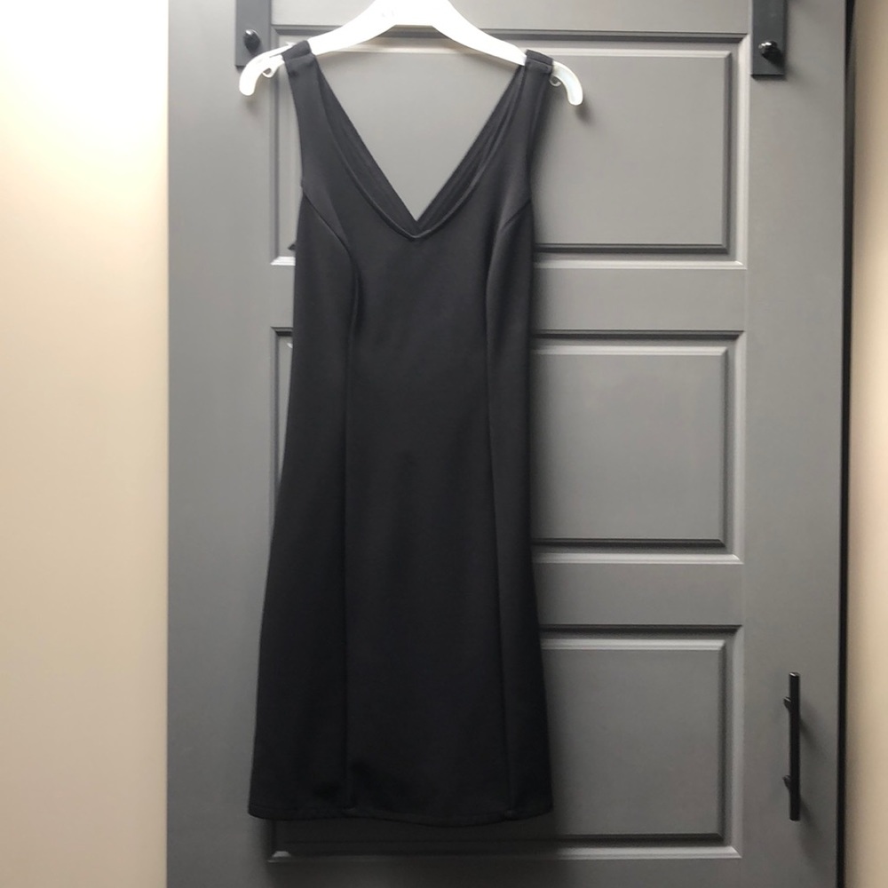 Dress with crisscrossing in back